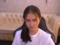 Hi, my name is Talia , and I’m just an ordinary cheerful girl — the kind who finds joy in little things, laughs easily, and can’t resist being a little sly when no one’s watching. I like making people smile, and honestly, I enjoy being the center of attention in small, cozy company, but only up to a point. You see, I have a small dream — not a huge, fame-and-glory kind of dream, but a quiet, personal one.